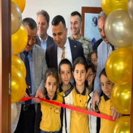 Kütüphaneye milli futbolcunun adı verildi