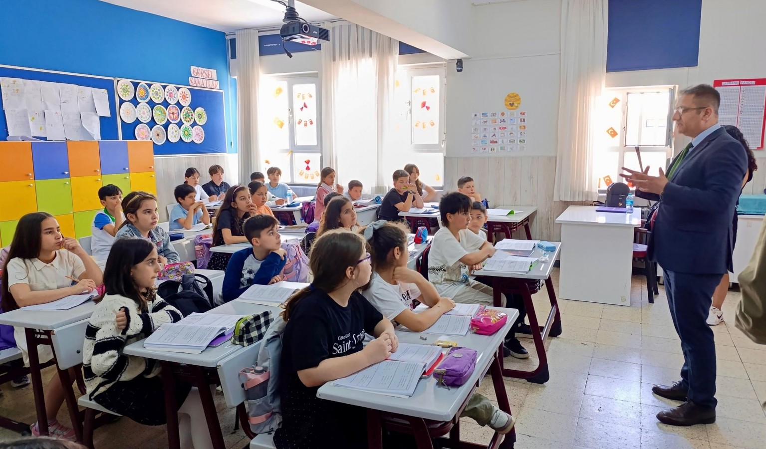 "Çocuklarımızın en iyi şekilde yetişmesi için hep birlikte çalışıyoruz";